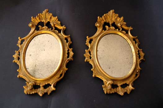 antiquariato: A couple of golden mirror, with decorations, XIX century