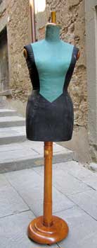 Dressmaker's dummy, black and green, with wood base