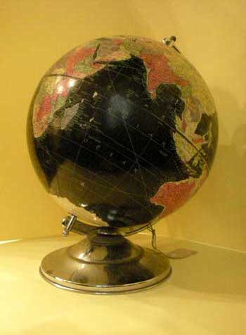 Black globe, with metal base
